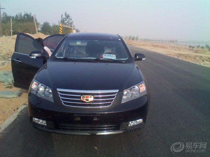 提车了,帝豪715舒适版,金色的.